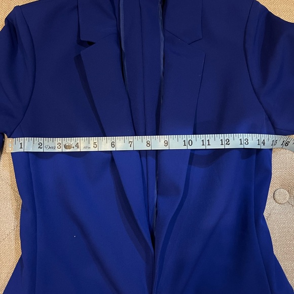 This is a blue suit comes with blazer and pants. It is an XS. - Picture 7 of 10